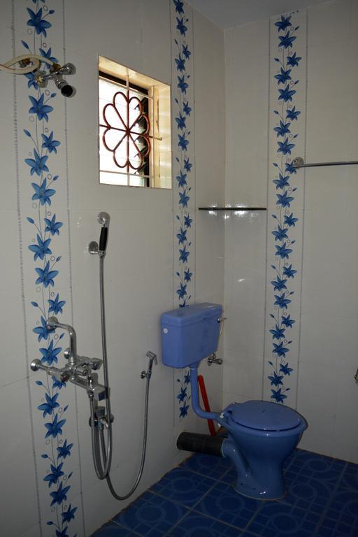 Vailankanni Guesthouse Morjim Room photo